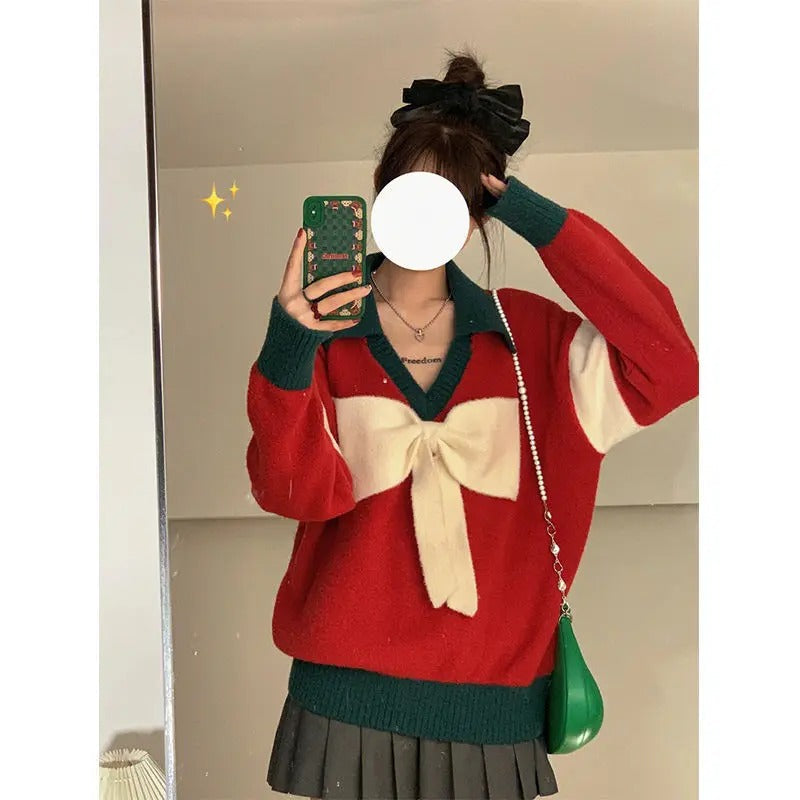 Fatima® | Warm women's knitted sweater with V-neck and bow