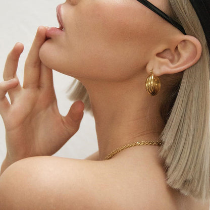 Klassinen Kulta Korvarengas ajattomalla viehätyksellä