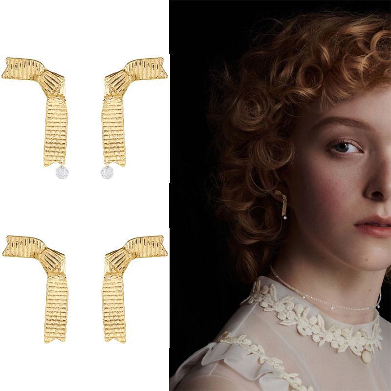 Kaunis Kulta Korvarengas ainutlaatuisella tyylillä