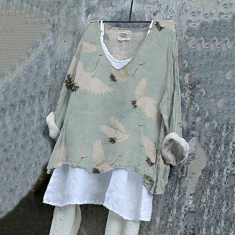 Sulokkaasti suunniteltu Pusero