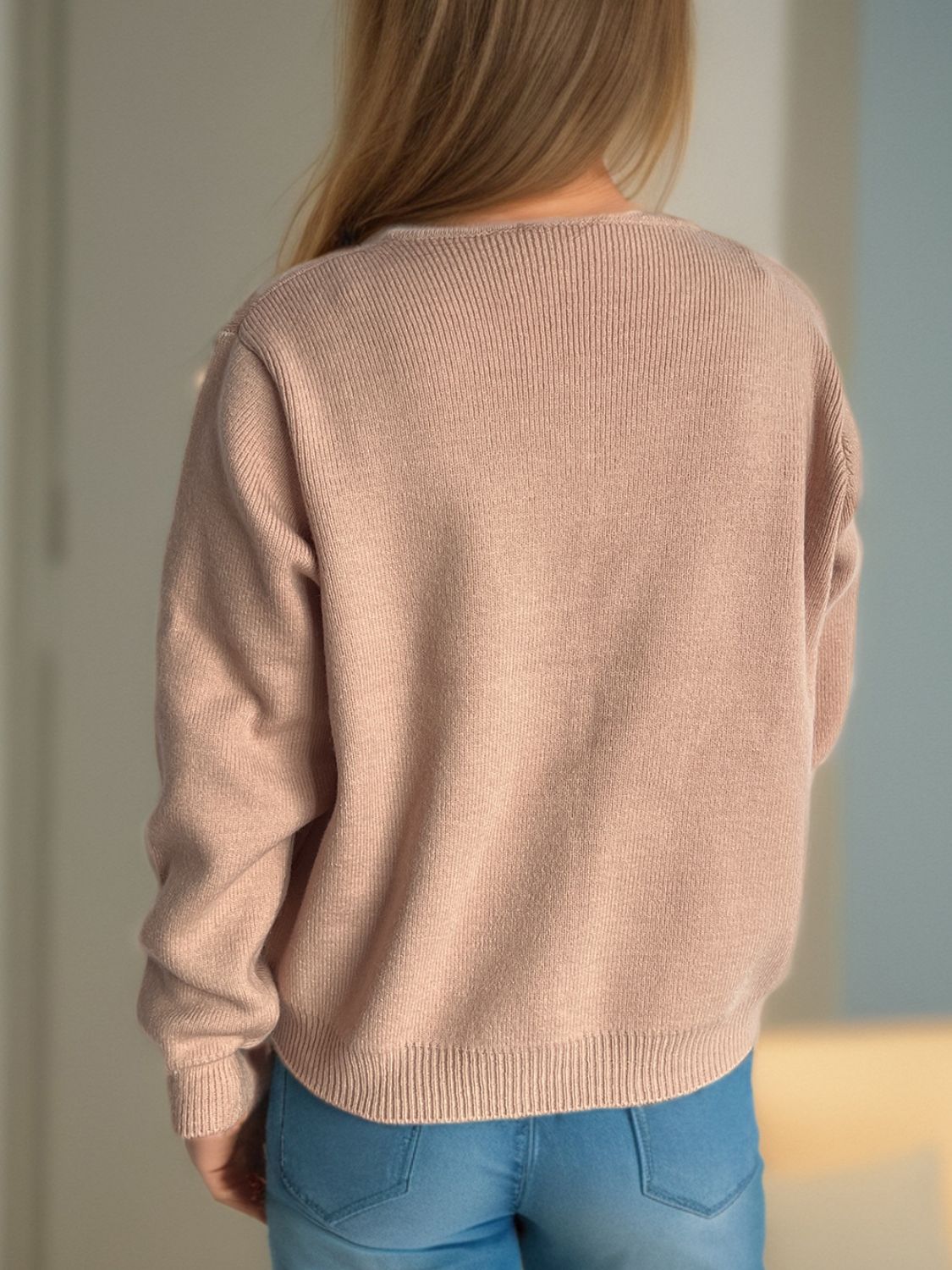 A Vintage Style Cardigan with Delicate Timeless Details
