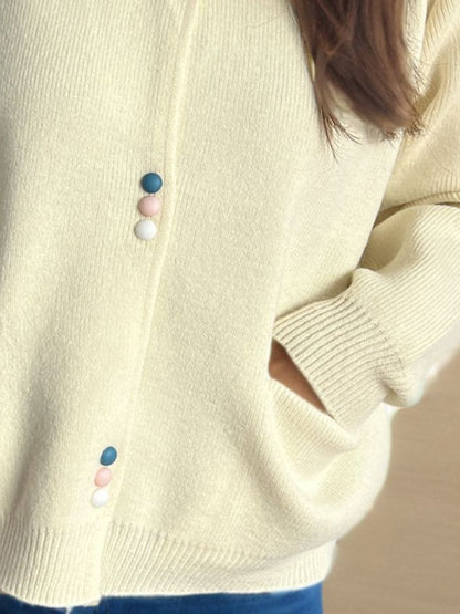 A Vintage Style Cardigan with Delicate Timeless Details