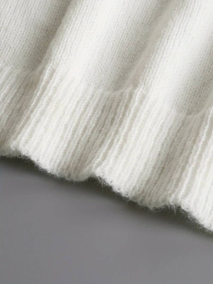 A Vintage Style Sweater with Delicate Timeless Details