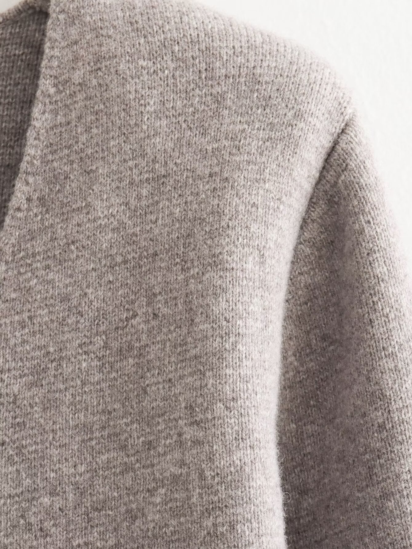 A Vintage Style Cardigan with Delicate Timeless Details