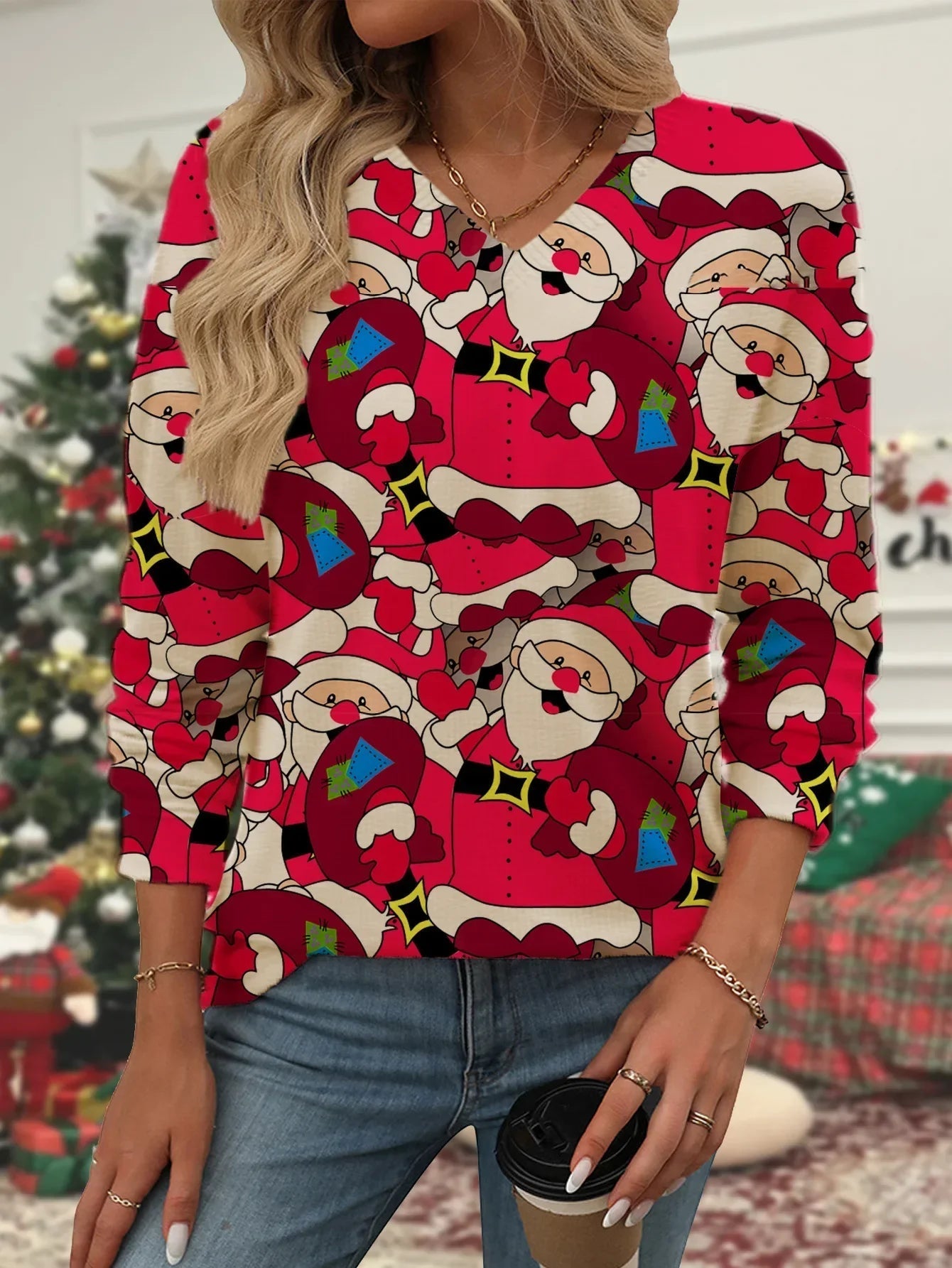 Hannah® | Warm women's knitted sweater with Santa Claus print and V-neck