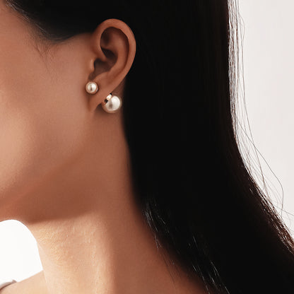 Klassinen Helmi Korvarengas ajattomalla viehätyksellä