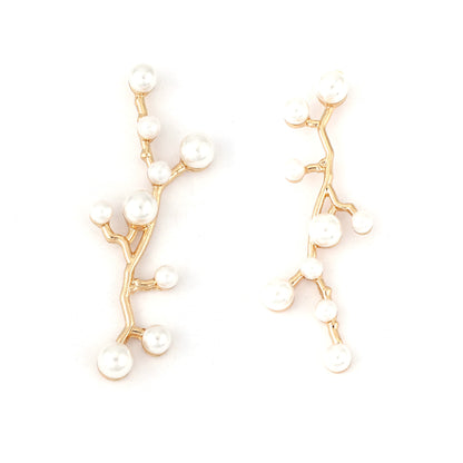 Klassinen Helmi Korvarengas ajattomalla viehätyksellä