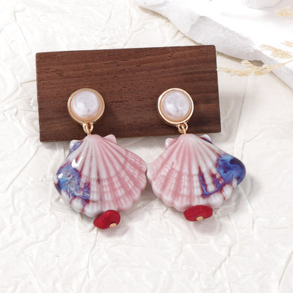 Klassinen Helmi Korvarengas ajattomalla viehätyksellä