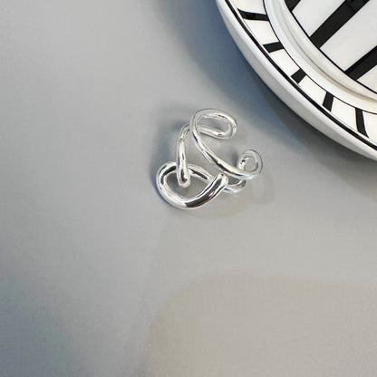 Käsintehty vintage Koru