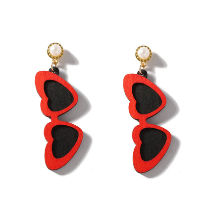 Klassinen Helmi Korvarengas ajattomalla viehätyksellä