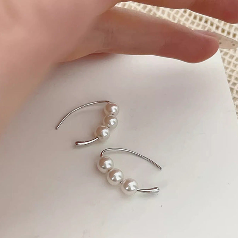 Klassinen Helmi Korvarengas ajattomalla viehätyksellä