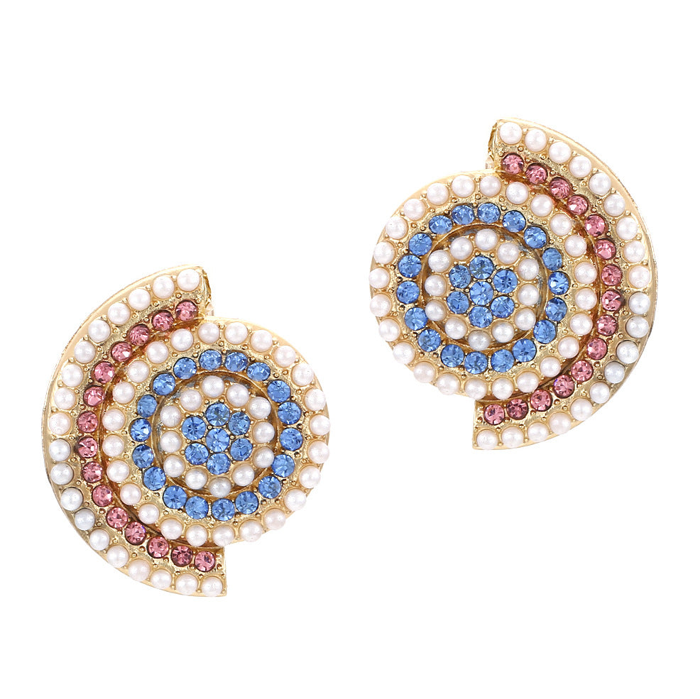 Klassinen Helmi Korvarengas ajattomalla viehätyksellä