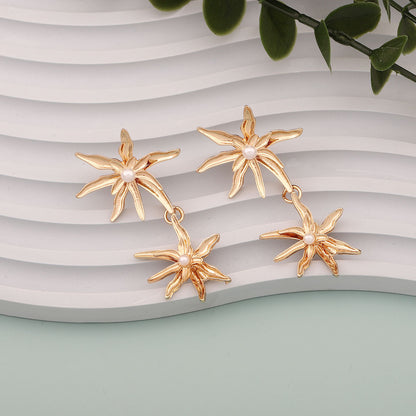 Klassinen Helmi Korvarengas ajattomalla viehätyksellä