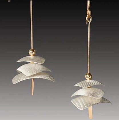 Kaunis Korvarengas ainutlaatuisella tyylillä