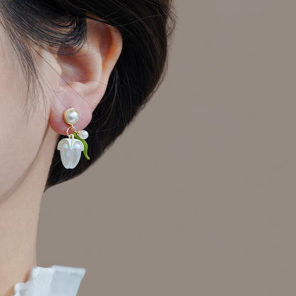 Kaunis Korvarengas ainutlaatuisella tyylillä