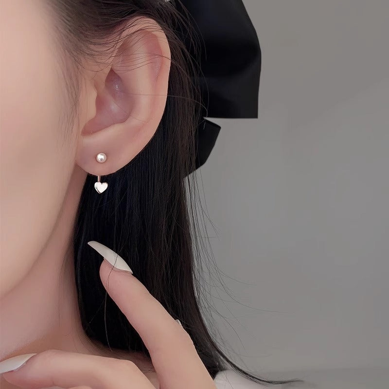 Klassinen Helmi Korvarengas ajattomalla viehätyksellä