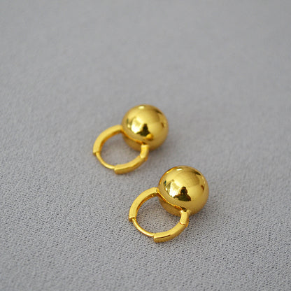 Klassinen Kulta Korvarengas ajattomalla viehätyksellä