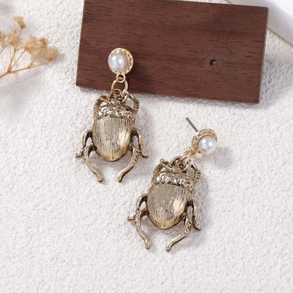 Klassinen Helmi Korvarengas ajattomalla viehätyksellä