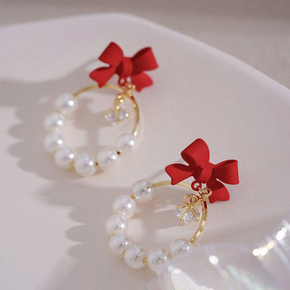 Klassinen Helmi Korvarengas ajattomalla viehätyksellä