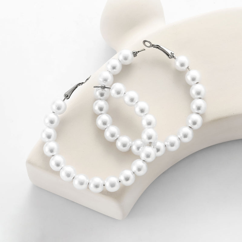 Klassinen Helmi Korvarengas ajattomalla viehätyksellä