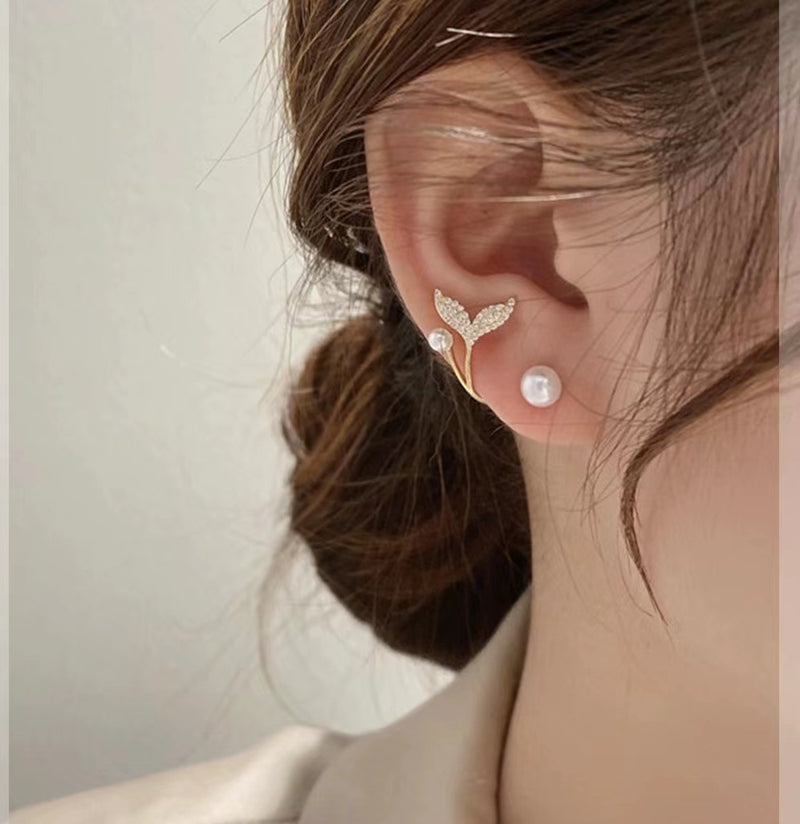 Kaunis Helmi Korvarengas ainutlaatuisella tyylillä