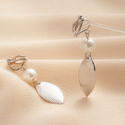 Klassinen Helmi Korvarengas ajattomalla viehätyksellä