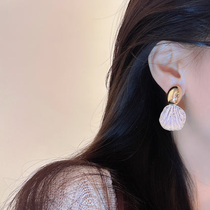 Kaunis Korvarengas ainutlaatuisella tyylillä