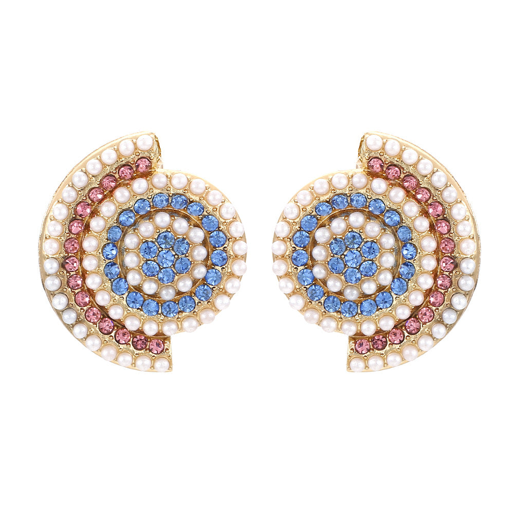 Klassinen Helmi Korvarengas ajattomalla viehätyksellä