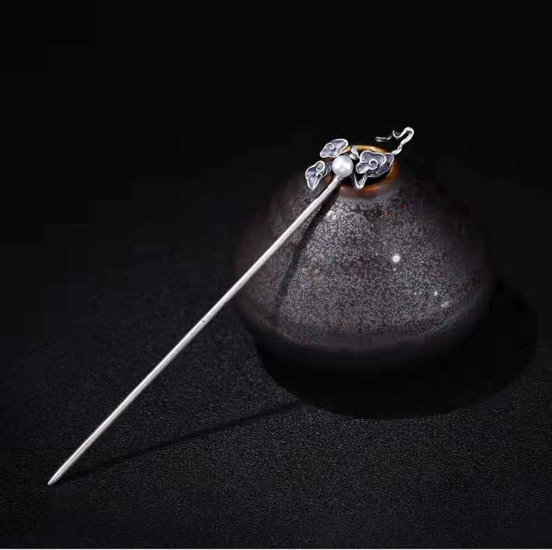 Klassinen Hopea Koru ajattomalla viehätyksellä