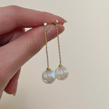 Klassinen Helmi Korvarengas ajattomalla viehätyksellä