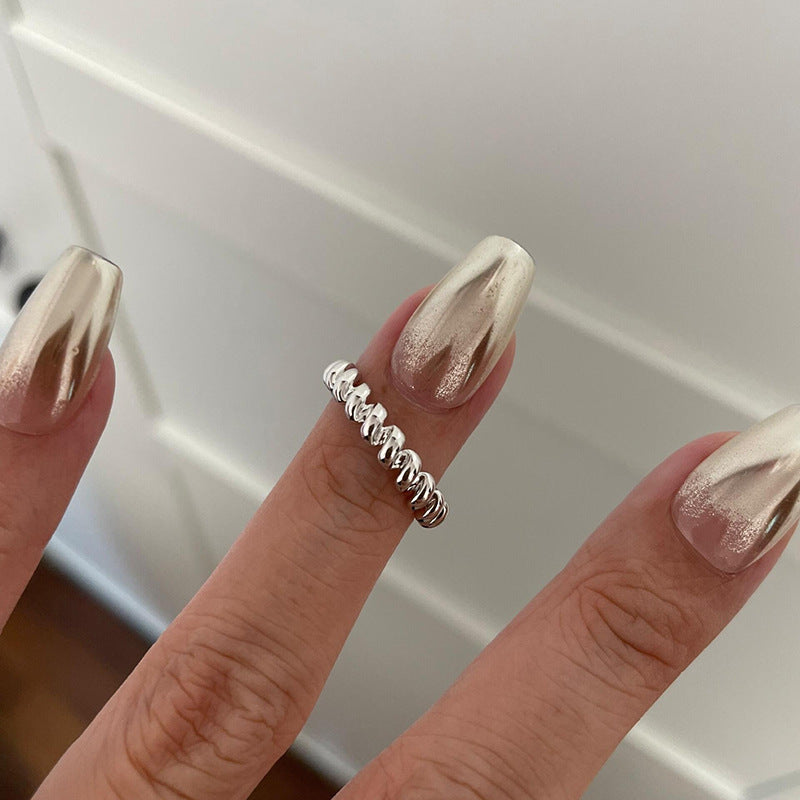 Käsintehty vintage Koru