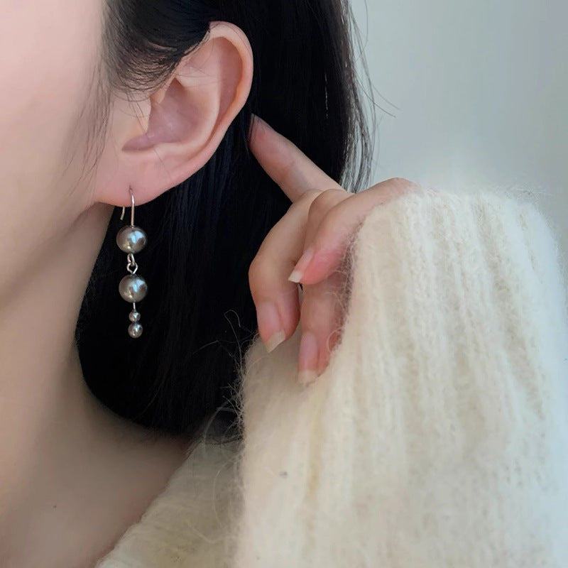 Klassinen Helmi Korvarengas ajattomalla viehätyksellä