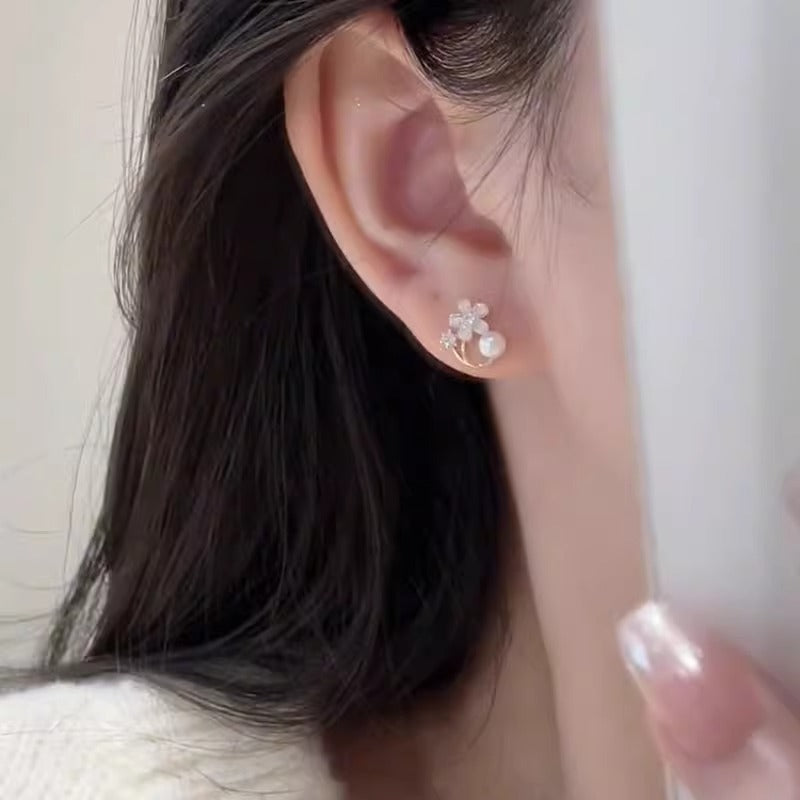 Kaunis Helmi Korvarengas ainutlaatuisella tyylillä