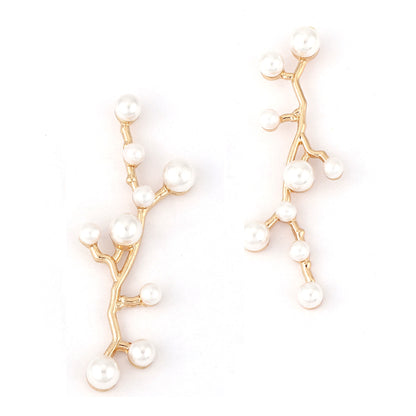 Klassinen Helmi Korvarengas ajattomalla viehätyksellä