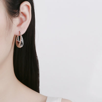 Kaunis Korvarengas ainutlaatuisella tyylillä