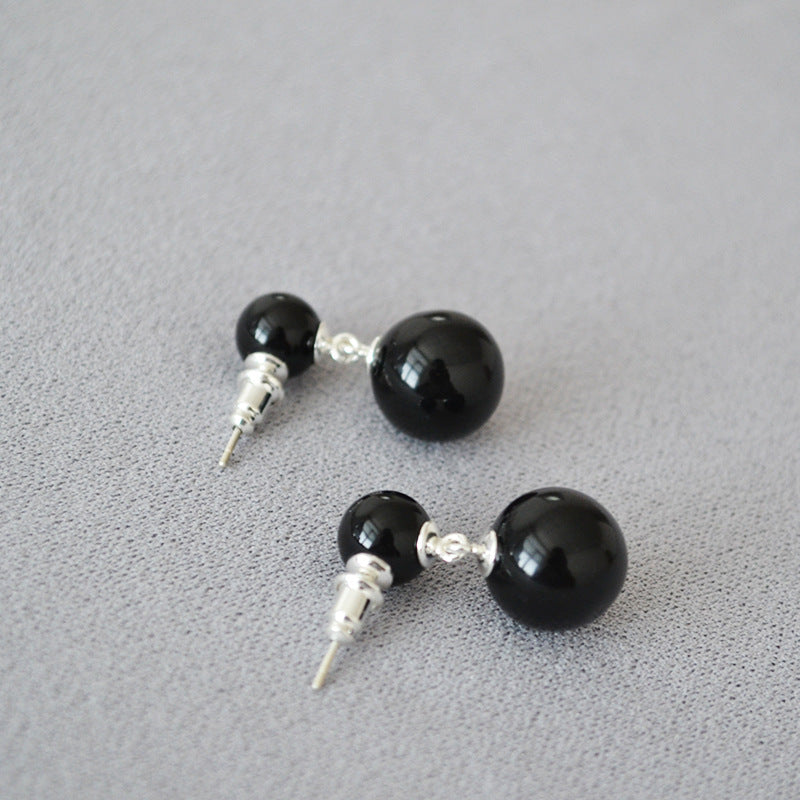 Klassinen Korvarengas ajattomalla viehätyksellä