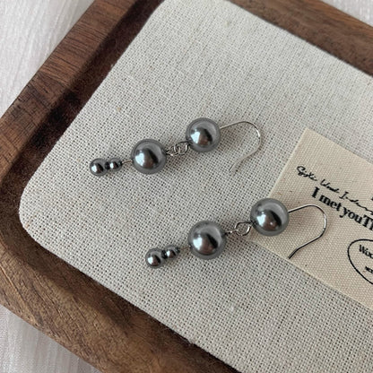 Klassinen Helmi Korvarengas ajattomalla viehätyksellä