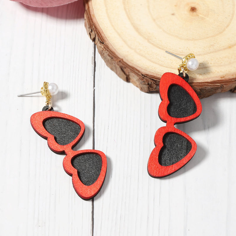 Klassinen Helmi Korvarengas ajattomalla viehätyksellä