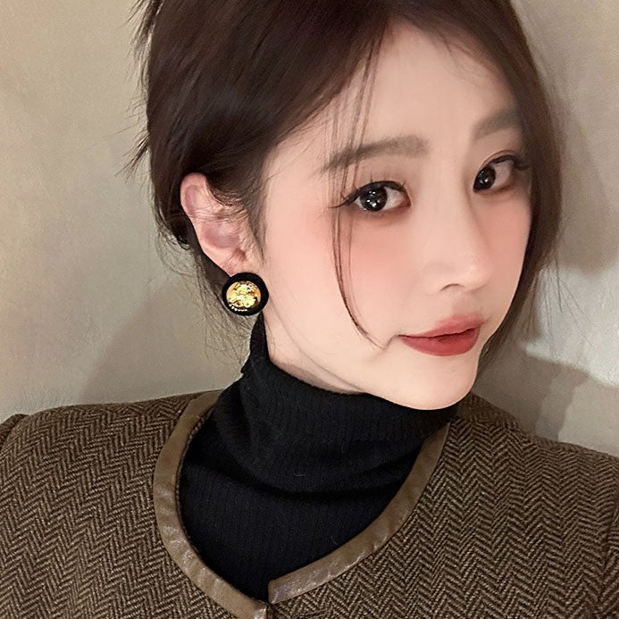 Kaunis Korvarengas ainutlaatuisella tyylillä