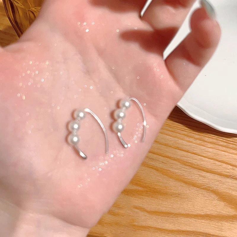 Klassinen Helmi Korvarengas ajattomalla viehätyksellä