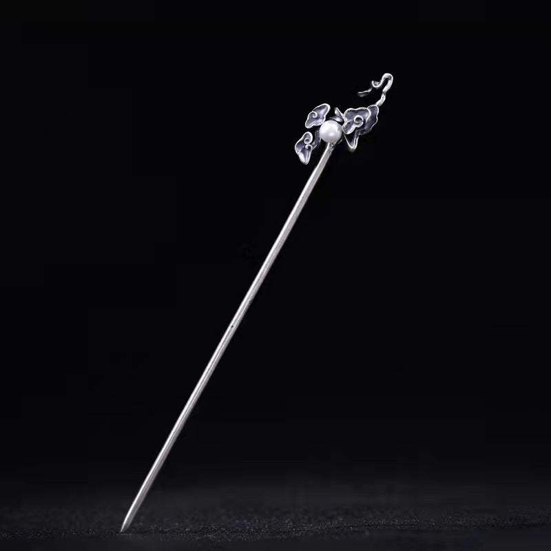 Klassinen Hopea Koru ajattomalla viehätyksellä