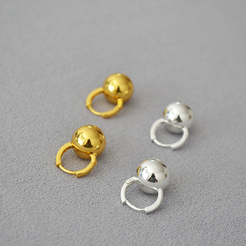 Klassinen Kulta Korvarengas ajattomalla viehätyksellä