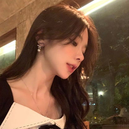 Kaunis Helmi Korvarengas ainutlaatuisella tyylillä