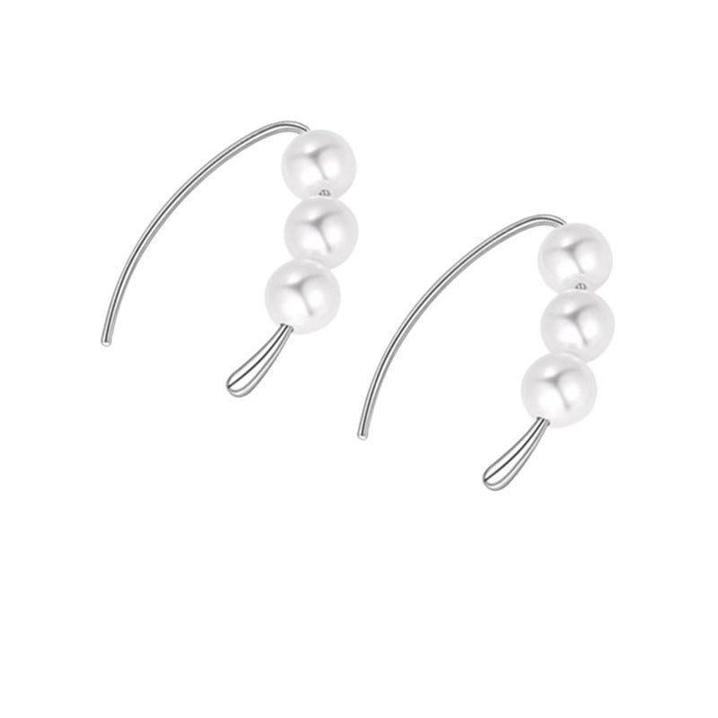 Klassinen Helmi Korvarengas ajattomalla viehätyksellä