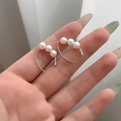 Klassinen Helmi Korvarengas ajattomalla viehätyksellä