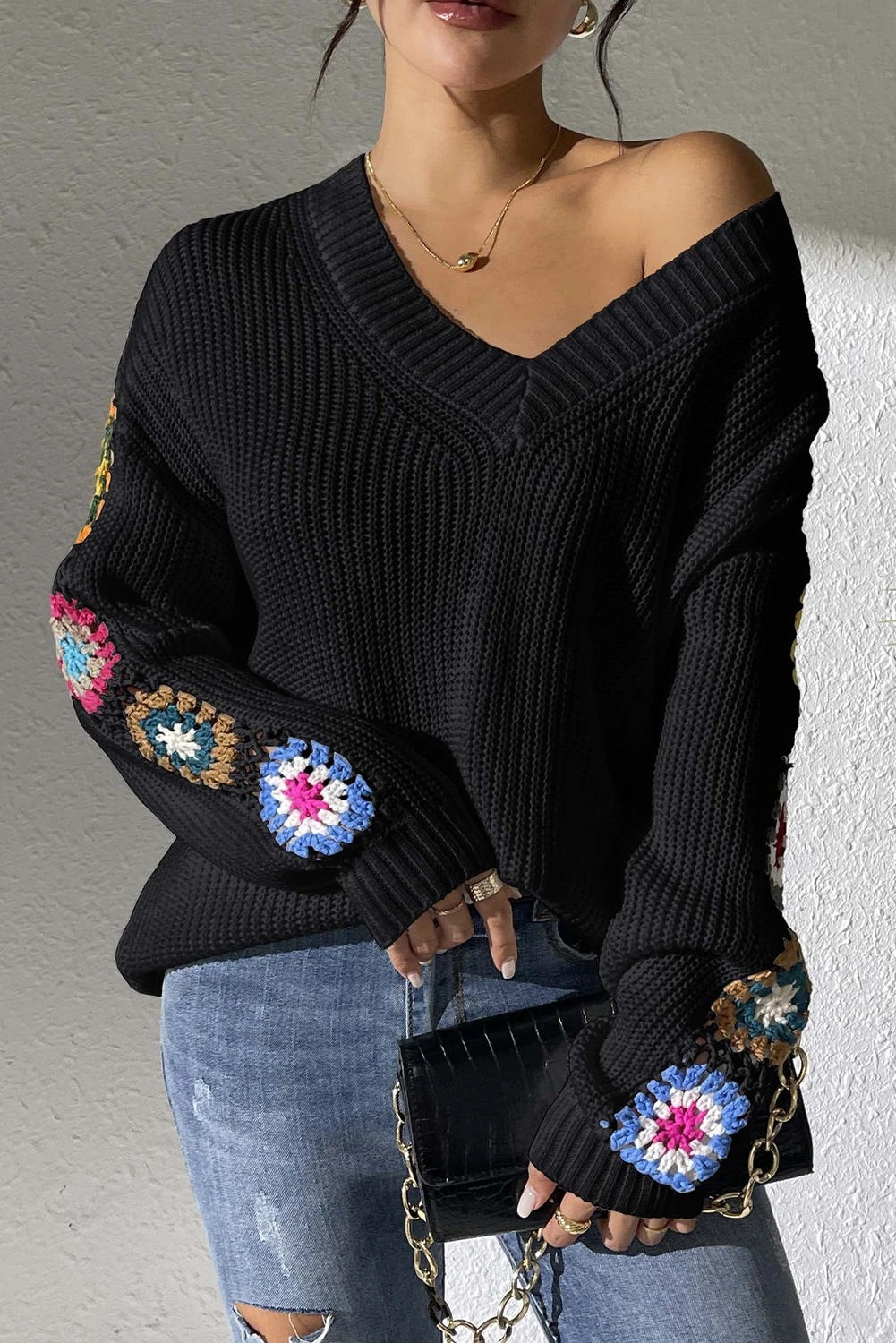 Heidi® | Black sweater with crochet floral splice and V-neck