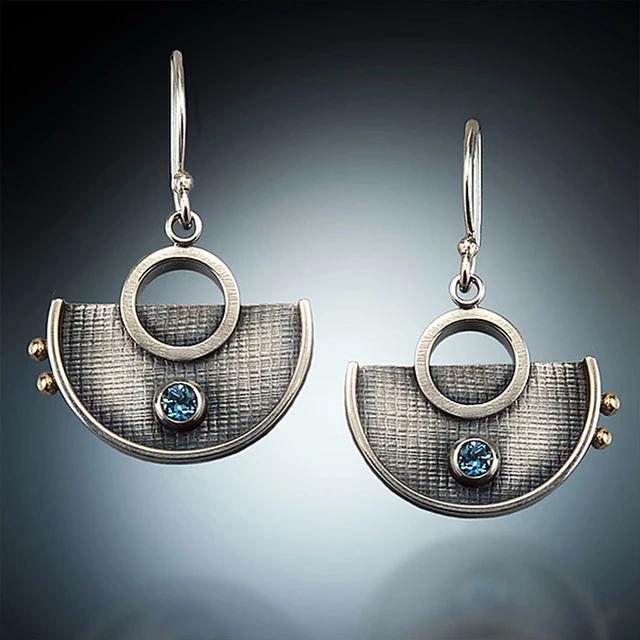 Klassinen Hopea Korvarengas ajattomalla viehätyksellä