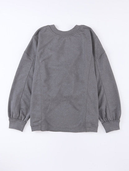 A Vintage Style Sweater with Delicate Timeless Details